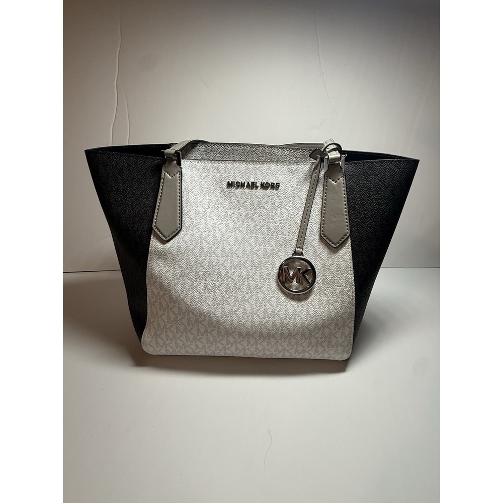 Michael Kors Kimberly Small Bonded Tote featuring a signature MK logo print.